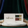 Fragrance bottles in a white box with 'FragTrends' branding on a light background