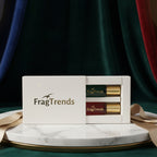 Fragrance bottles in a white box with 'FragTrends' branding on a light background