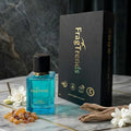 Fragrance bottle and packaging with 'FragTrends' branding on a marble surface.