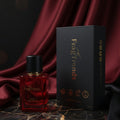 Red FragTrends perfume bottle with black cap and matching black box on a white background