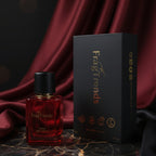 Red FragTrends perfume bottle with black cap and matching black box on a white background